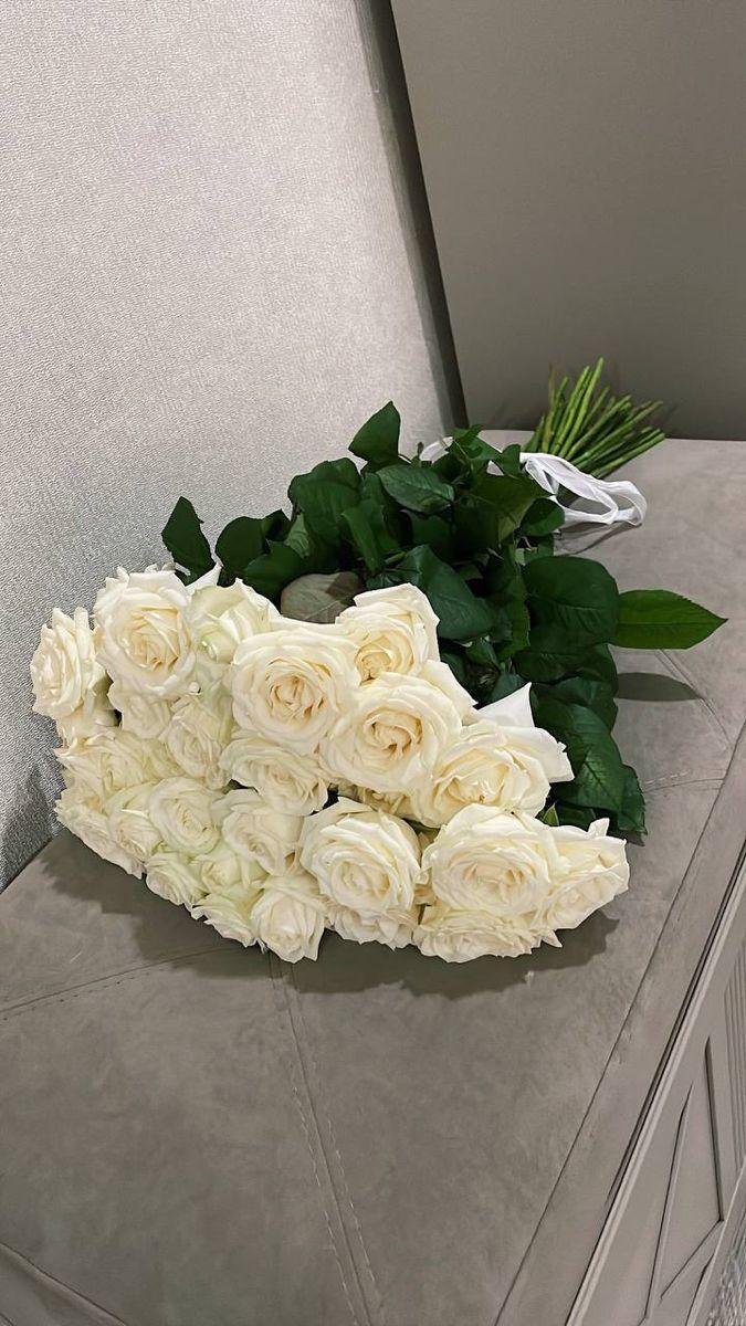 PlumeRidgeHome workshop space where corporate flower arrangements are designed and prepared for business delivery